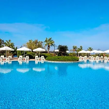 Отель Merit Crystal Cove Casino And
